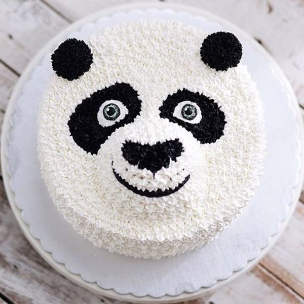An amazing panda cake my sister in law made me for my 27th birthday.  Strawberry and passionfruit ganche layers with a custard cream icing. The  pandas are handmade too : r/Baking